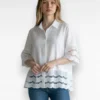 witte blouse