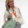 witte blouse